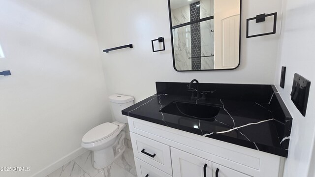 5536 N 375th Ave, Tonopah, AZ 85354 - full bathroom with toilet, baseboards, marble finish floors, a stall shower, and vanity