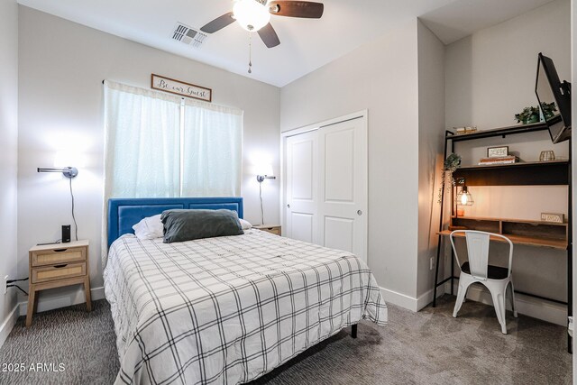 carpeted bedroom featuring a ceiling fan, baseboards, visible vents, and a closet