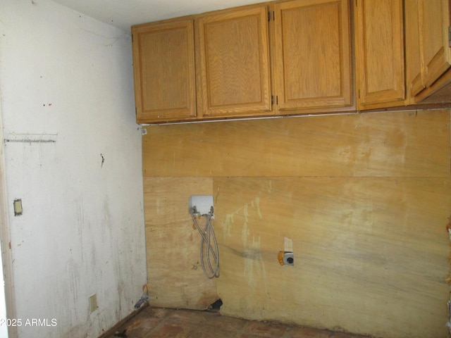 5716 E Desert Vista Trl, Cave Creek, AZ 85331 - laundry room featuring cabinet space, hookup for a washing machine, and hookup for an electric dryer