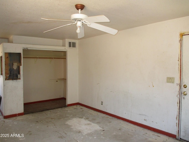 5716 E Desert Vista Trl, Cave Creek, AZ 85331 - unfurnished bedroom with baseboards, a closet, concrete flooring, and ceiling fan
