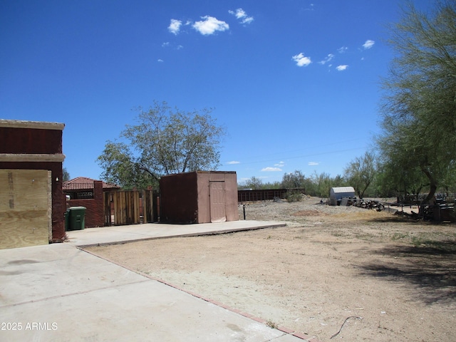 5716 E Desert Vista Trl, Cave Creek, AZ 85331 - view of shed featuring fence and a gate