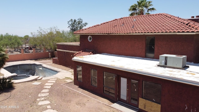 5716 E Desert Vista Trl, Cave Creek, AZ 85331 - rear view of property with fence, a tiled roof, and stucco siding