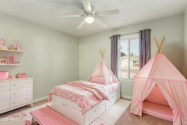 bedroom featuring ceiling fan and light colored carpet