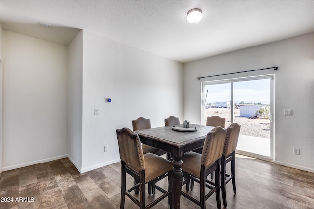 dining area featuring hardwood / wood-style floors