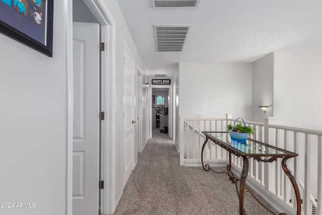 corridor with carpet floors