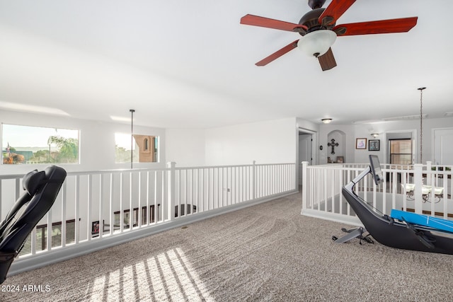 hallway with carpet flooring