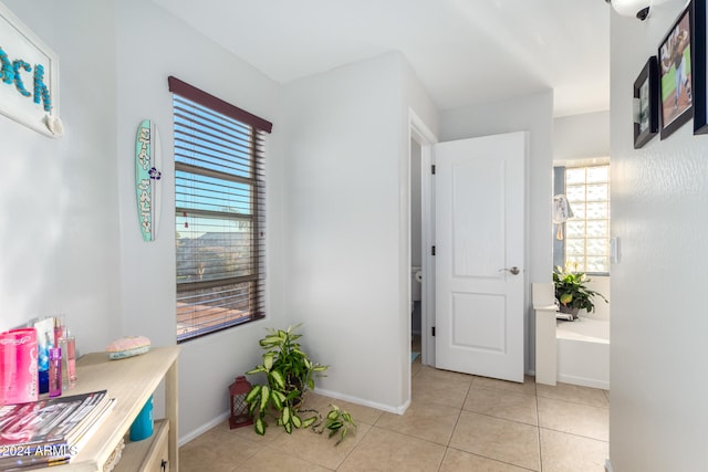 interior space with light tile patterned flooring