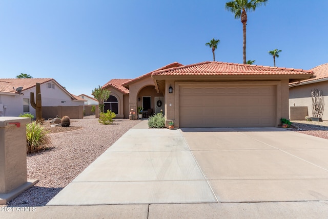 view of front of property featuring a garage