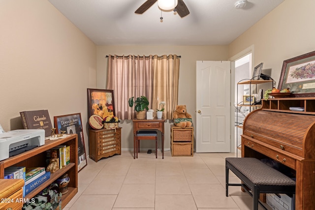 miscellaneous room with ceiling fan and light tile patterned flooring