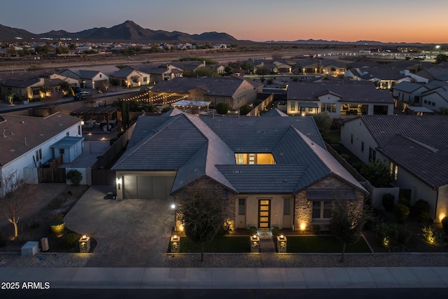 aerial view at dusk with a mountain view