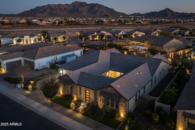 aerial view at dusk with a mountain view