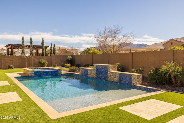 view of swimming pool with a mountain view and an in ground hot tub