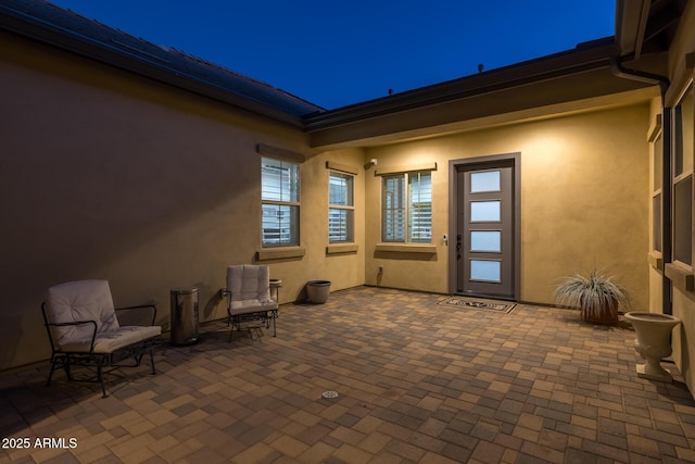 view of patio at night