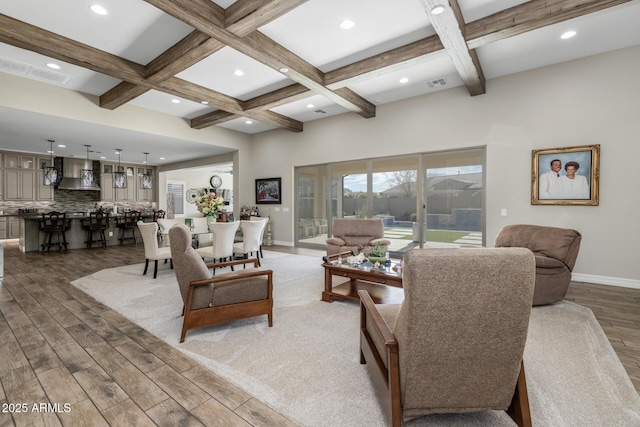 living room featuring dark hardwood / wood-style flooring, beam ceiling, and coffered ceiling