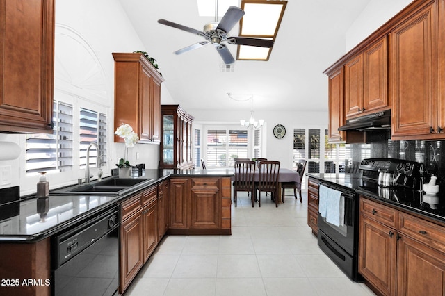 kitchen featuring sink, vaulted ceiling, light tile patterned floors, kitchen peninsula, and black appliances