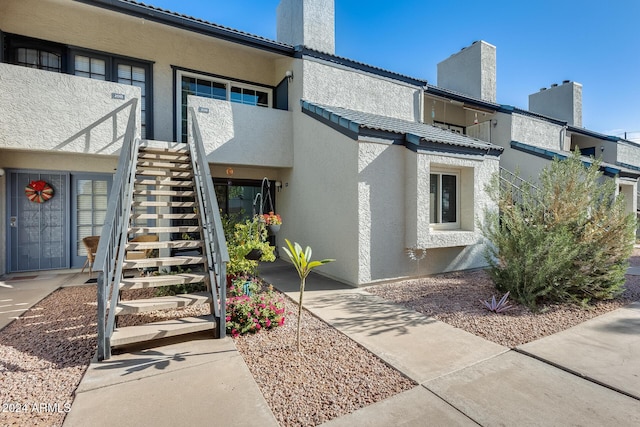 doorway to property with a balcony