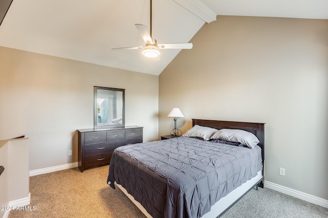 carpeted bedroom featuring lofted ceiling with beams and ceiling fan