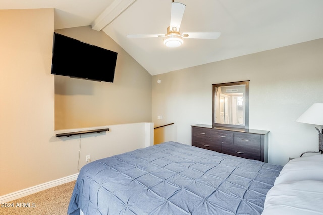 bedroom featuring light carpet, ceiling fan, and lofted ceiling with beams