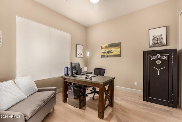 office with light wood-type flooring