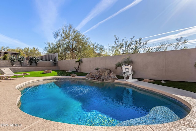 view of pool featuring a patio