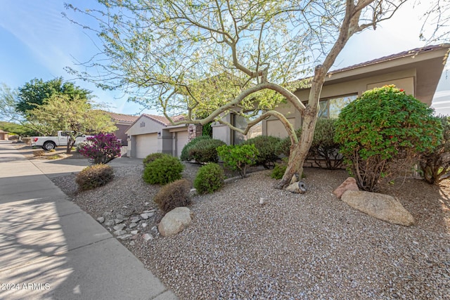 view of front of home with a garage