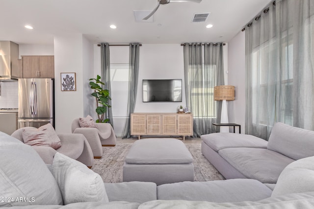 living room featuring ceiling fan