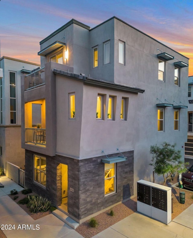 modern home featuring a balcony