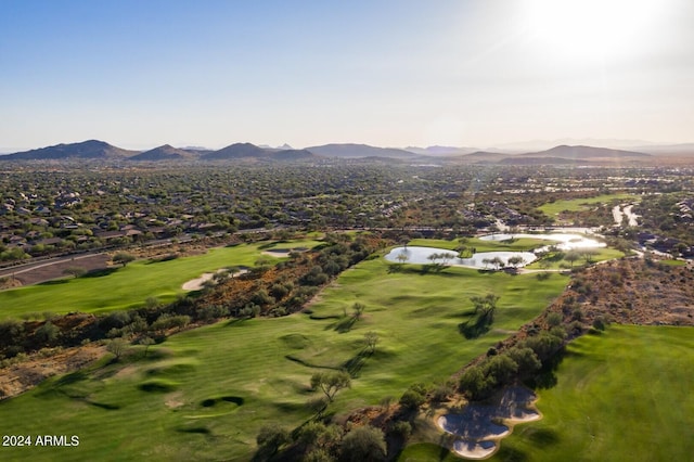 birds eye view of property with a mountain view