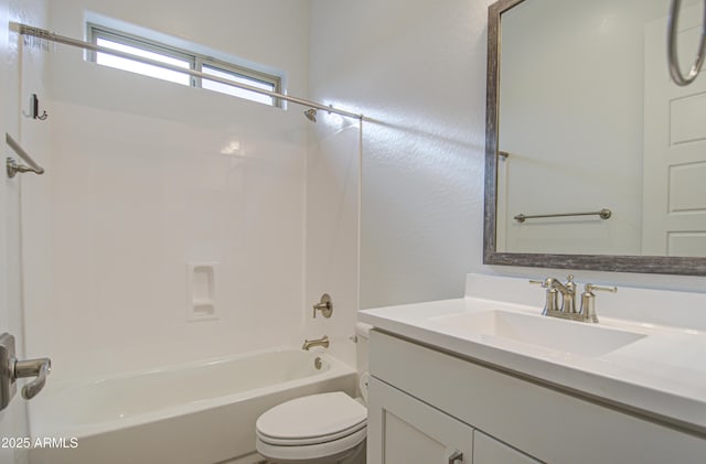 full bath featuring toilet,  shower combination, and vanity