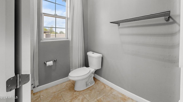 7171 W Quarter Horse Run, Coolidge, AZ 85128 - bathroom featuring baseboards and toilet