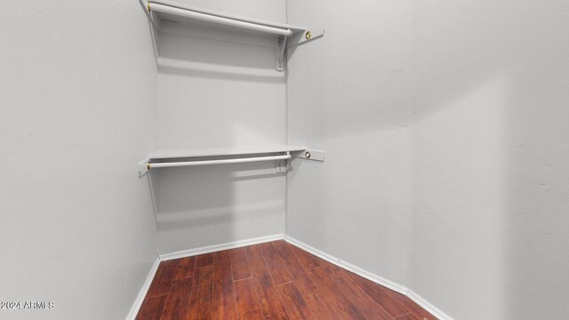 7171 W Quarter Horse Run, Coolidge, AZ 85128 - walk in closet with dark wood finished floors