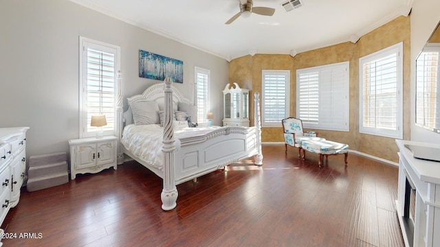 7171 W Quarter Horse Run, Coolidge, AZ 85128 - bedroom featuring crown molding, dark wood-style flooring, baseboards, visible vents, and a ceiling fan