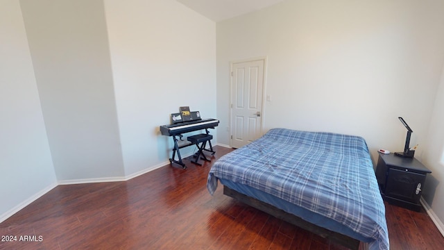 7171 W Quarter Horse Run, Coolidge, AZ 85128 - bedroom featuring baseboards and wood finished floors