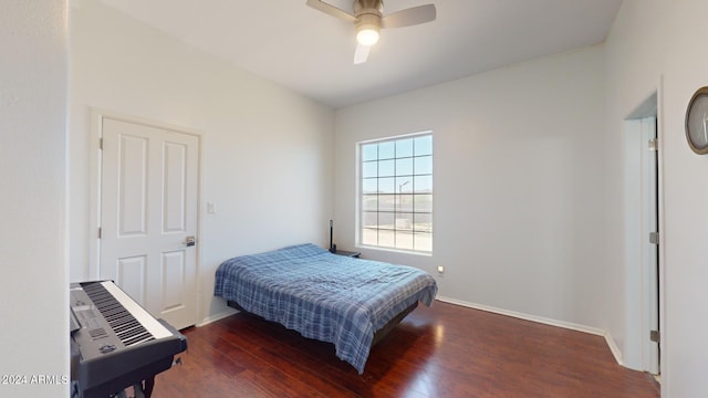 7171 W Quarter Horse Run, Coolidge, AZ 85128 - bedroom with baseboards, wood finished floors, and a ceiling fan