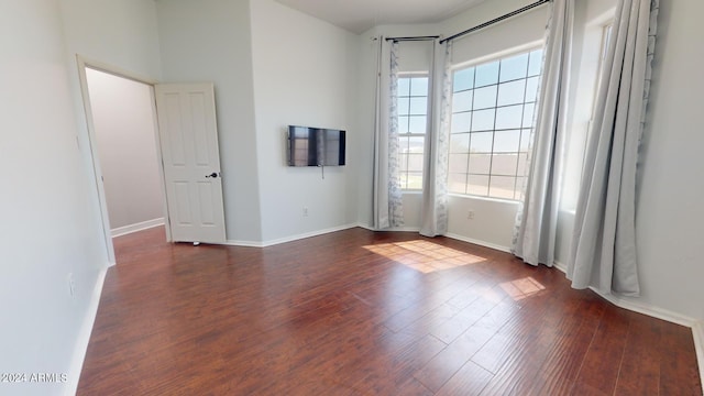 7171 W Quarter Horse Run, Coolidge, AZ 85128 - spare room with dark wood-type flooring and baseboards