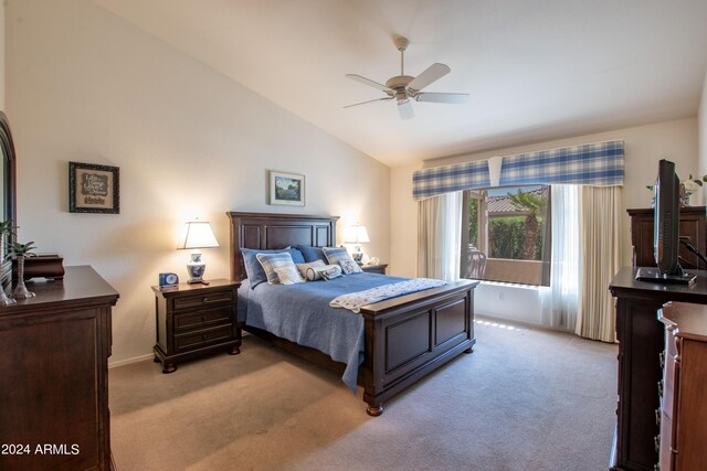 tiled living room with built in features, ceiling fan, and lofted ceiling