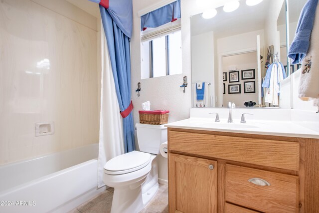 clothes washing area with light tile patterned floors, independent washer and dryer, and cabinets