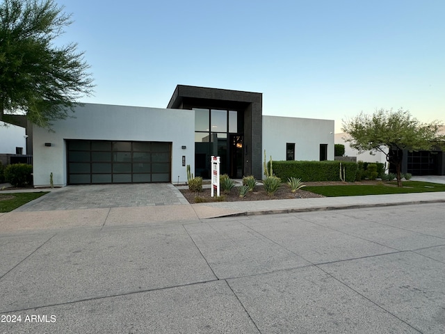 modern home featuring a garage