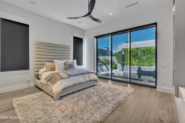 bedroom with ceiling fan, access to outside, and light hardwood / wood-style flooring