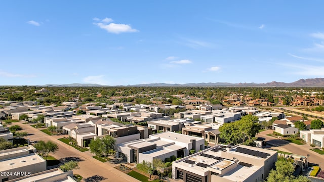 birds eye view of property featuring a mountain view