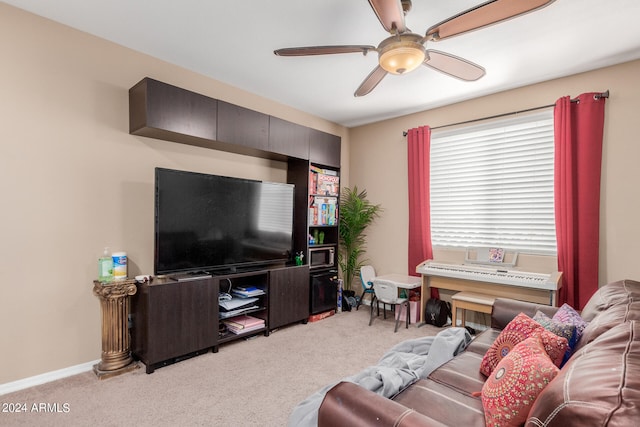 living room featuring ceiling fan and light carpet