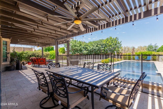 view of patio with ceiling fan, a fenced in pool, and an outdoor hangout area