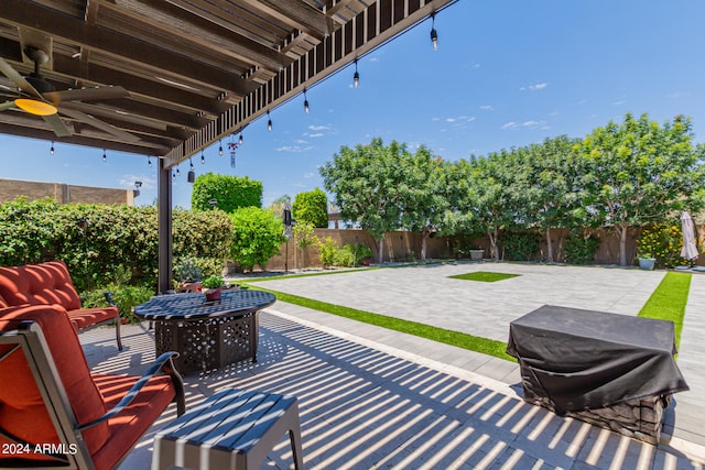 view of patio with ceiling fan