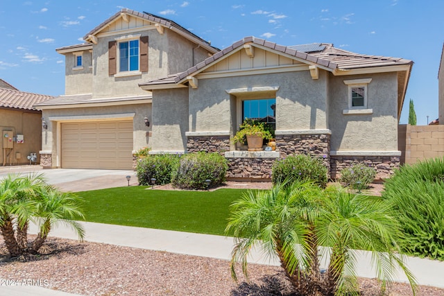 craftsman-style home featuring a front lawn, a garage, and solar panels