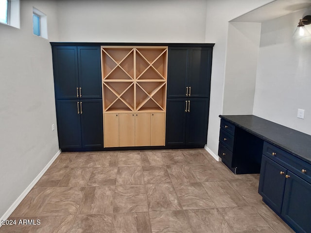 kitchen featuring blue cabinetry