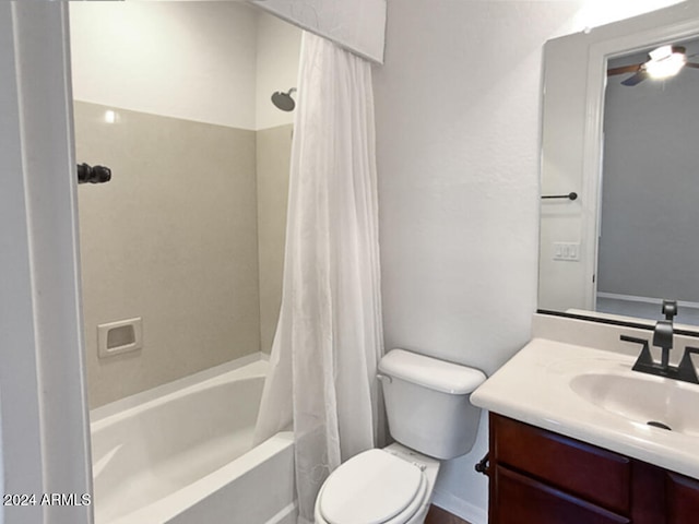 full bathroom with vanity, ceiling fan, toilet, and shower / bath combo