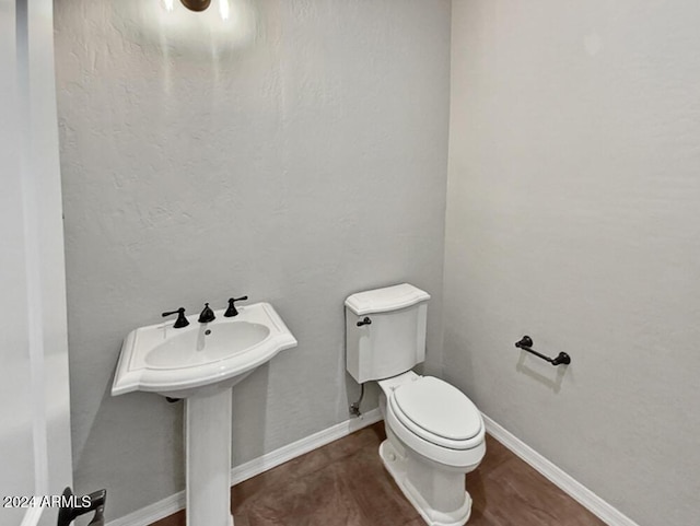 12446 W Bajada Rd, Peoria, AZ 85383 - bathroom featuring toilet and baseboards