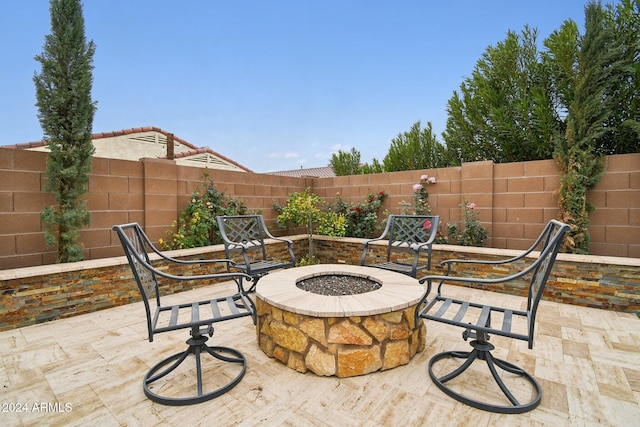 view of patio featuring a fire pit