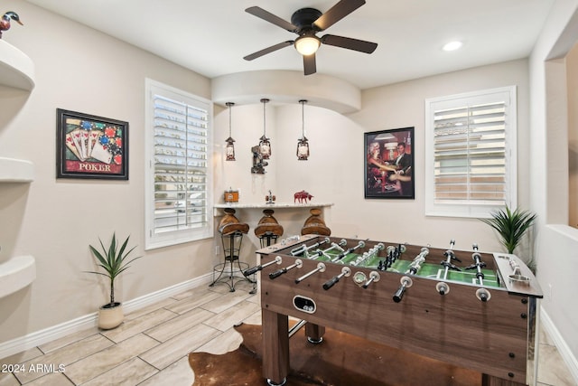 game room with ceiling fan