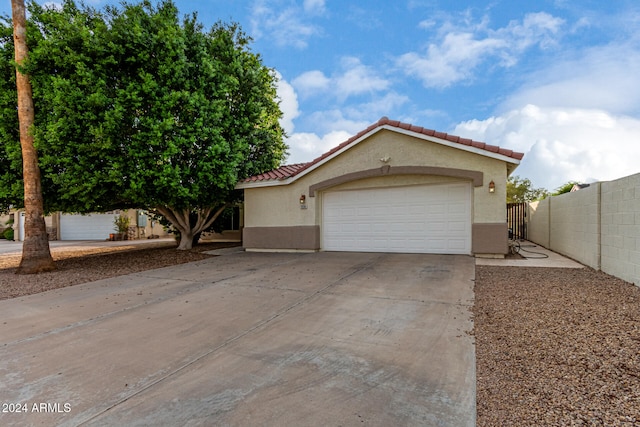 view of front of property featuring a garage